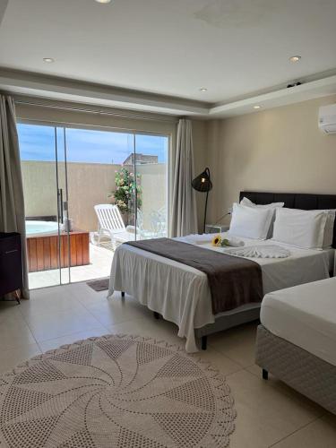 Suíte Deluxe com Banheira de Hidromassagem — foto 6