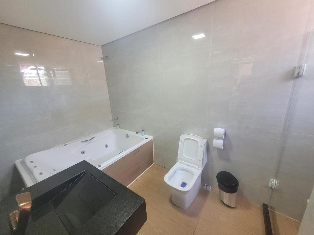 Quarto com Banheira de Hidromassagem — foto 14